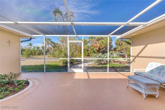 view of patio / terrace featuring a lanai