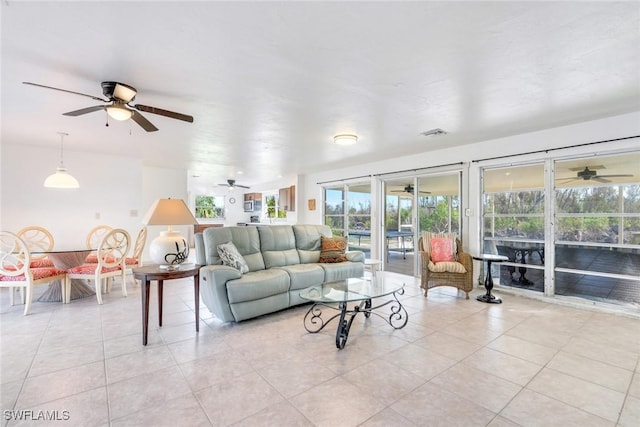 tiled living room with a wealth of natural light