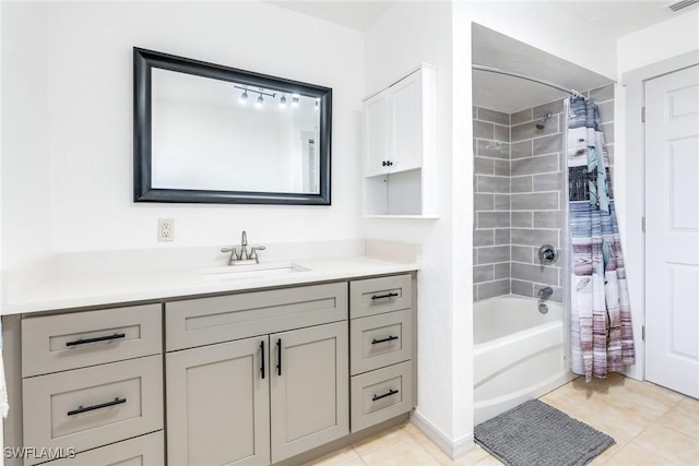 bathroom with tile patterned floors, vanity, and shower / tub combo