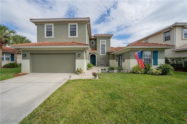 mediterranean / spanish-style house with a front yard and a garage