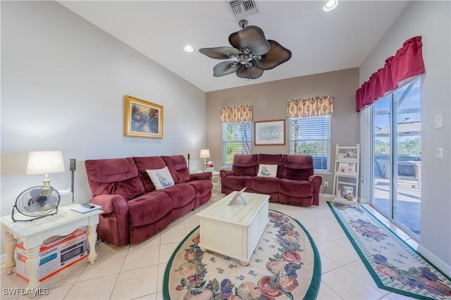 living room with ceiling fan, a healthy amount of sunlight, and light tile patterned floors