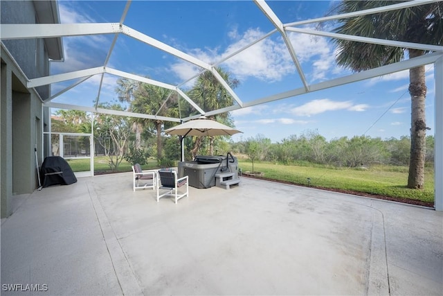 view of patio / terrace with a lanai