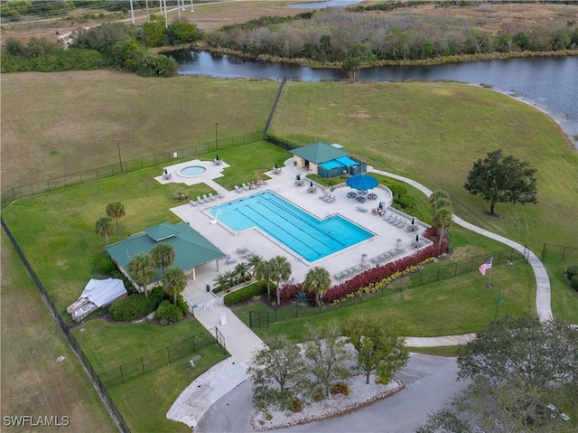 birds eye view of property featuring a water view