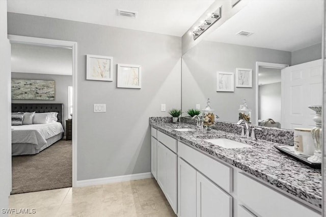 bathroom featuring vanity and tile patterned floors