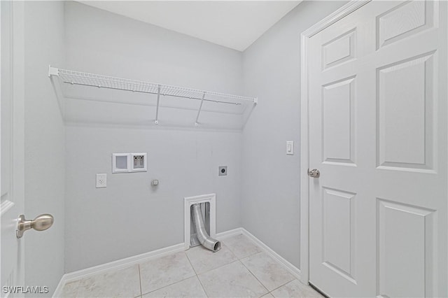 clothes washing area with electric dryer hookup, light tile patterned floors, hookup for a washing machine, and gas dryer hookup