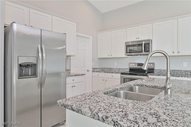 kitchen with white cabinetry and stainless steel appliances