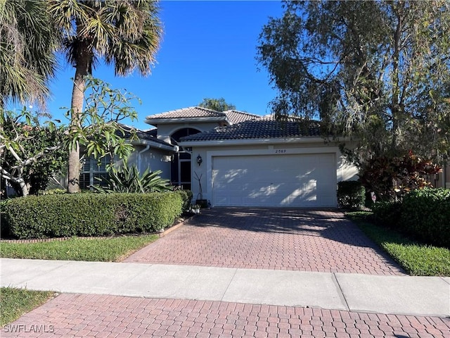 view of front of home with a garage