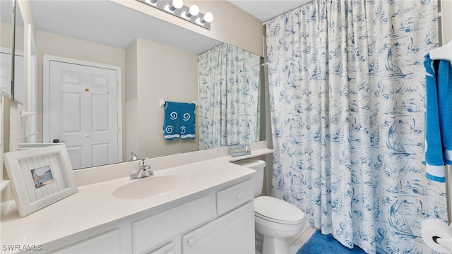 bathroom featuring walk in shower, vanity, and toilet