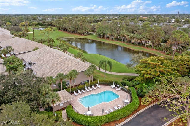 view of pool featuring a water view