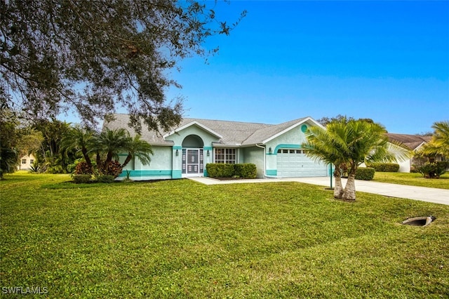 ranch-style house featuring a garage and a front lawn