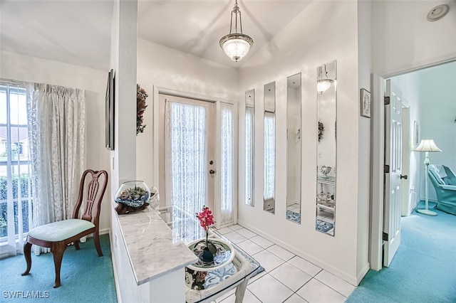 entrance foyer featuring light tile patterned flooring