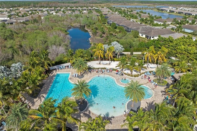 birds eye view of property featuring a water view