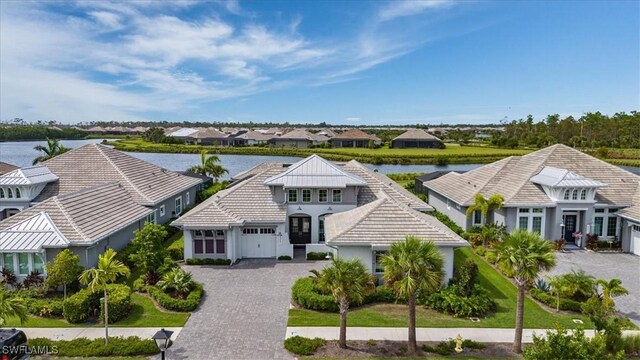 drone / aerial view featuring a water view