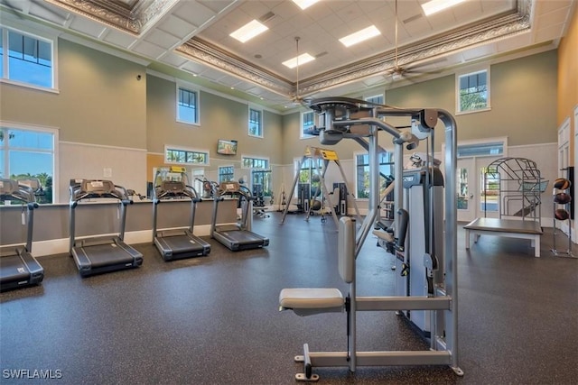 workout area featuring a high ceiling