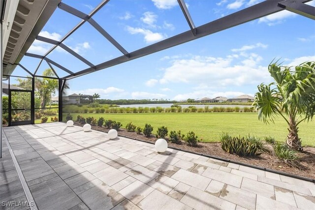 view of patio with glass enclosure