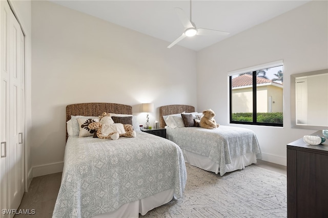 bedroom featuring ceiling fan and light hardwood / wood-style floors