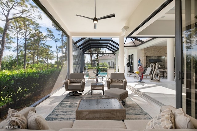 sunroom / solarium with ceiling fan