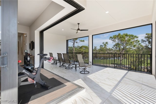 view of patio with ceiling fan