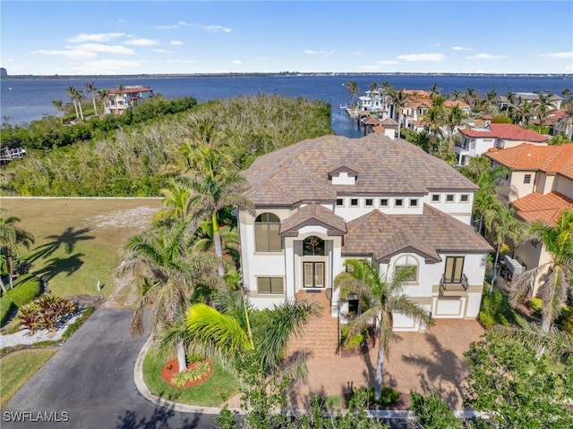 drone / aerial view featuring a water view