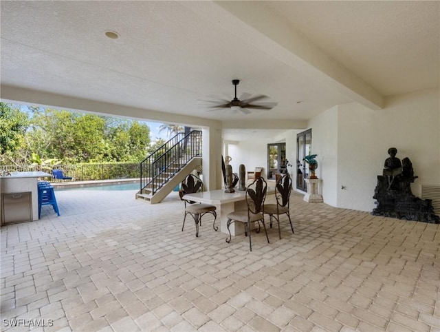 view of patio with ceiling fan