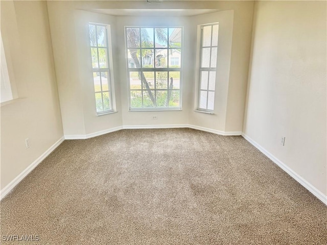 view of carpeted spare room