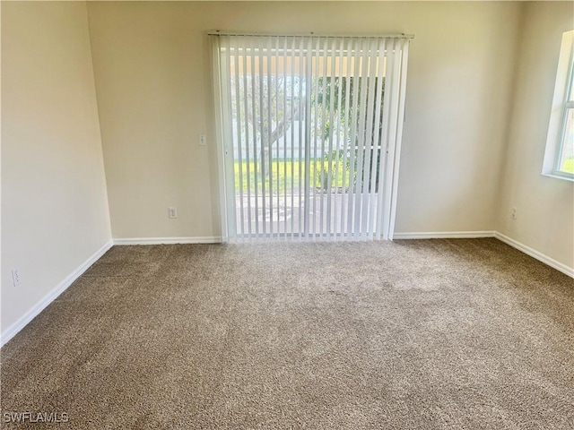 view of carpeted spare room