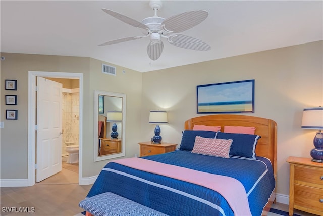 bedroom featuring connected bathroom, ceiling fan, and hardwood / wood-style floors