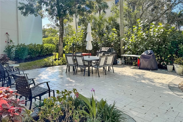 view of patio featuring a grill