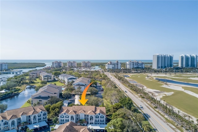 drone / aerial view with a water view