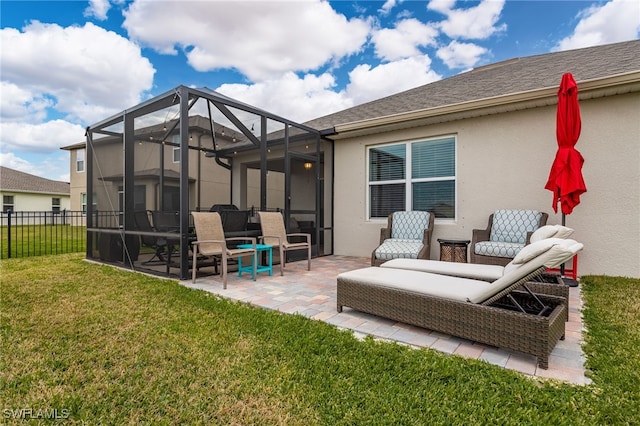 back of property with a patio area, a lanai, and a yard