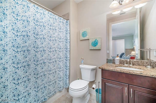 bathroom with a shower with shower curtain, vanity, toilet, and tile patterned flooring