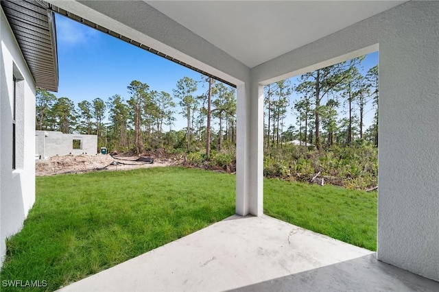 view of yard with a patio area