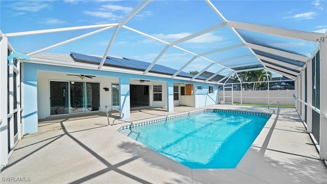 view of pool featuring a lanai and a patio