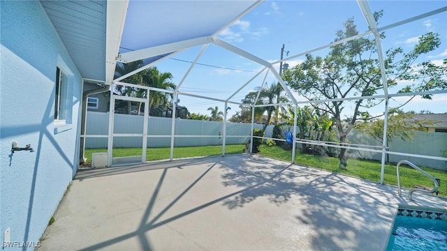 view of patio featuring a lanai and a fenced in pool