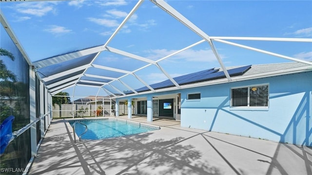 view of swimming pool featuring a patio area