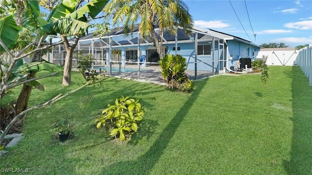 view of yard with a fenced in pool, glass enclosure, and central air condition unit