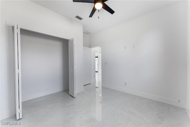 unfurnished bedroom featuring ceiling fan