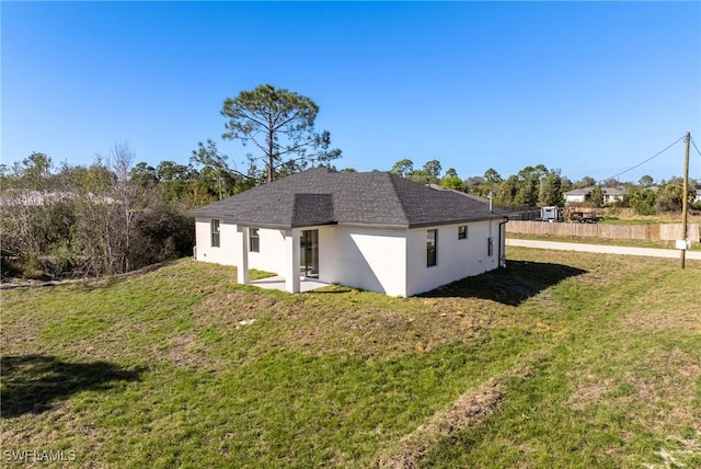 view of property exterior with a yard