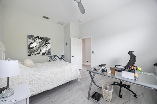 bedroom featuring ceiling fan and light hardwood / wood-style floors