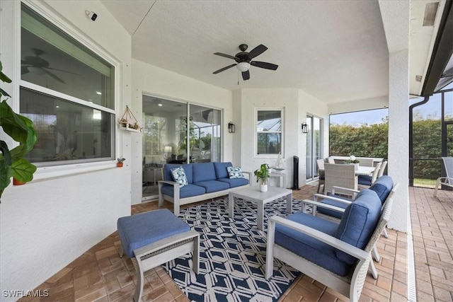 view of patio / terrace featuring an outdoor living space and ceiling fan