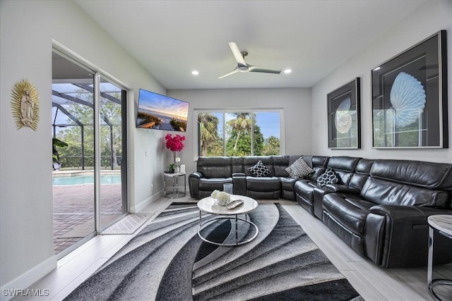 living room featuring ceiling fan