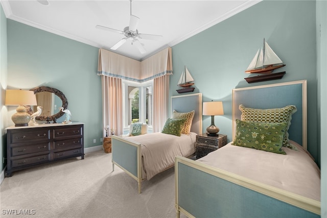 bedroom with ceiling fan, crown molding, and light carpet