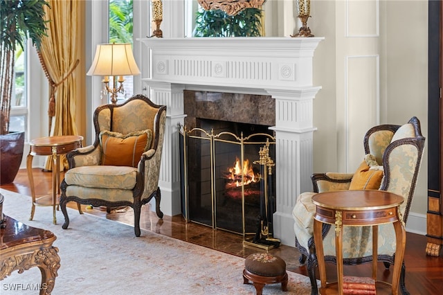 living area with a wealth of natural light and a high end fireplace