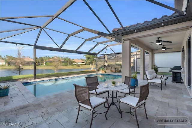 outdoor pool with a water view, a ceiling fan, a patio area, a grill, and a lanai