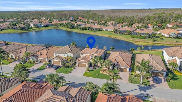 aerial view with a water view and a residential view