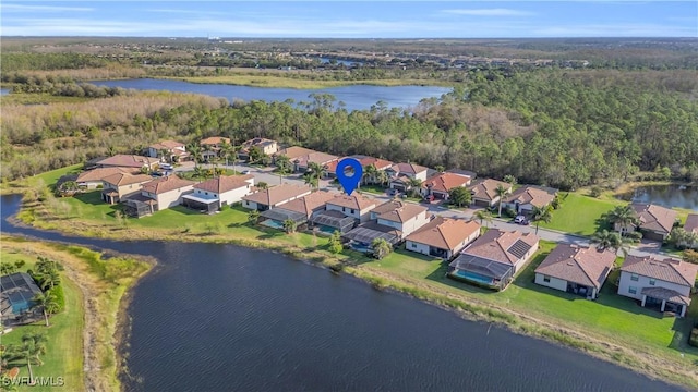 bird's eye view with a residential view and a water view