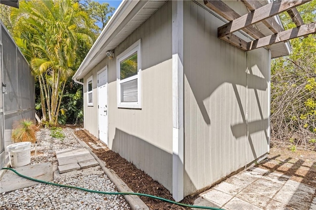 view of home's exterior featuring a pergola