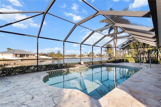 view of swimming pool featuring a lanai, a water view, and a patio