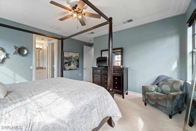 bedroom featuring connected bathroom, ceiling fan, light carpet, and ornamental molding