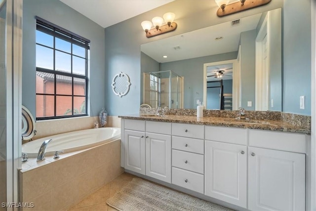 bathroom featuring tile patterned floors, ceiling fan, vanity, and independent shower and bath